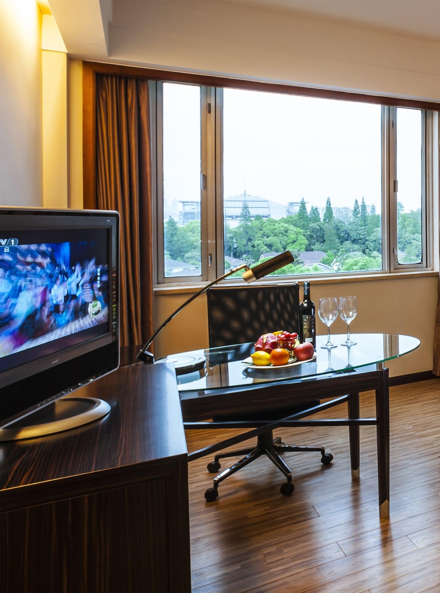 Grand Skylight Gardens Hotel Shanghai Bai Se Road Екстер'єр фото
