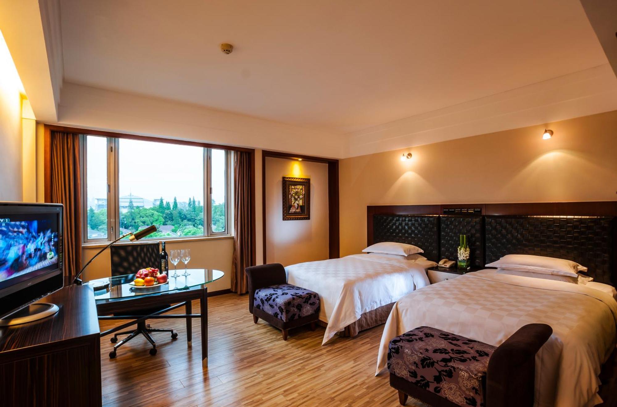 Grand Skylight Gardens Hotel Shanghai Bai Se Road Екстер'єр фото