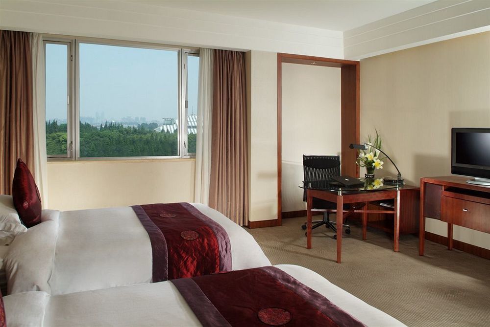 Grand Skylight Gardens Hotel Shanghai Bai Se Road Номер фото